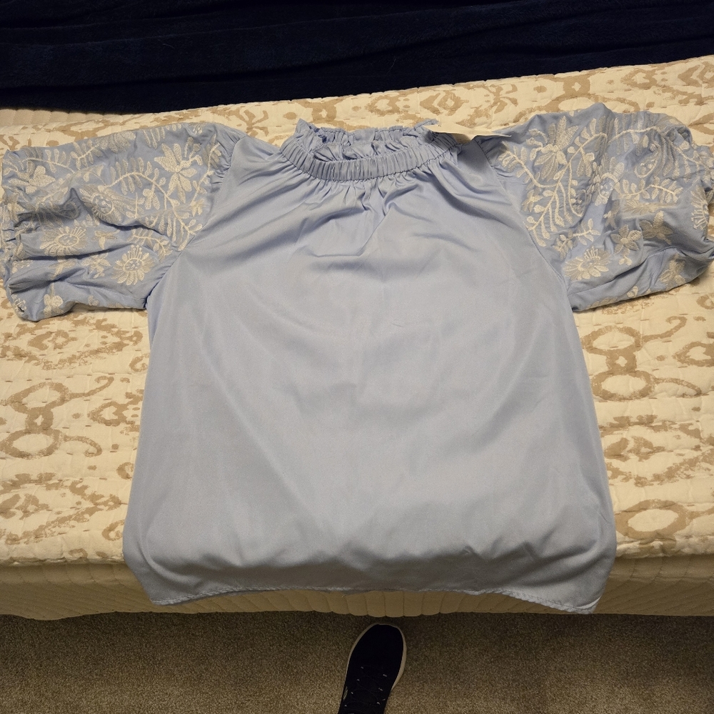 Luminary pale blue top